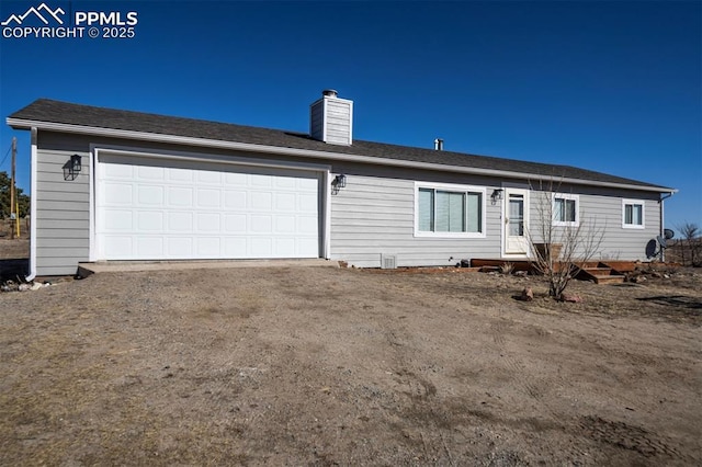 exterior space featuring a garage