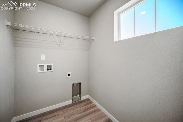 laundry room with washer hookup, hookup for an electric dryer, and hardwood / wood-style floors