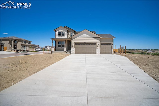 view of front of property featuring a garage and a porch