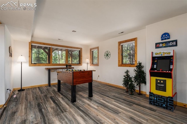 rec room with dark hardwood / wood-style flooring