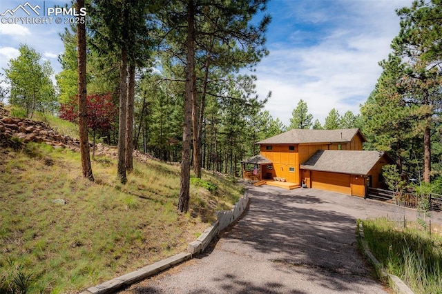 view of front of property featuring a garage