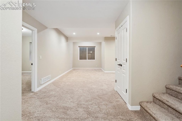 basement with light carpet