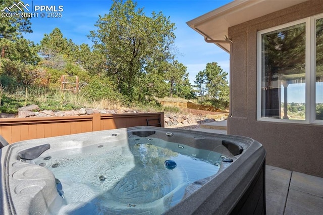 view of patio featuring a hot tub