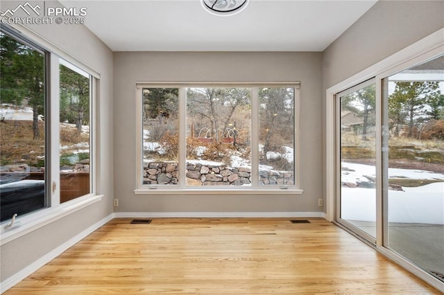 view of unfurnished sunroom