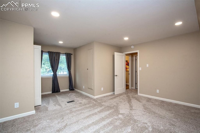 view of carpeted spare room