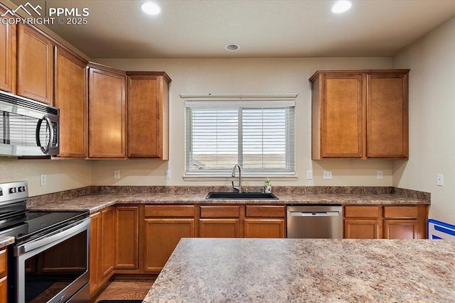 kitchen featuring sink and appliances with stainless steel finishes