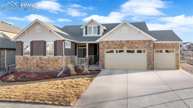 craftsman inspired home featuring a garage and covered porch