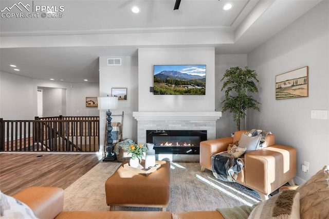 living room with light hardwood / wood-style flooring