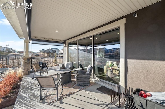 wooden deck featuring a patio area