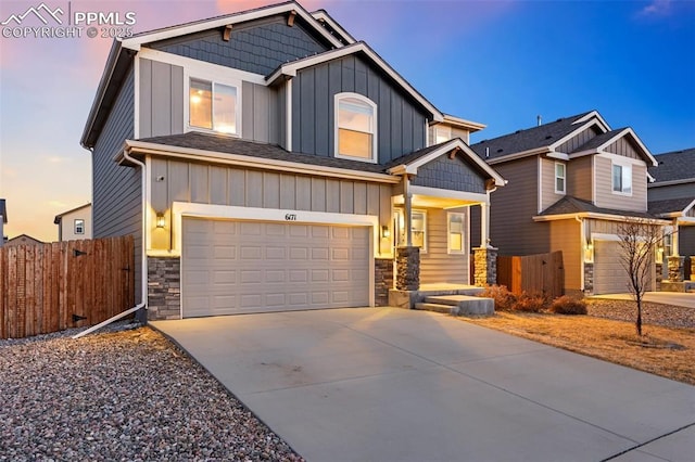 craftsman house with a garage