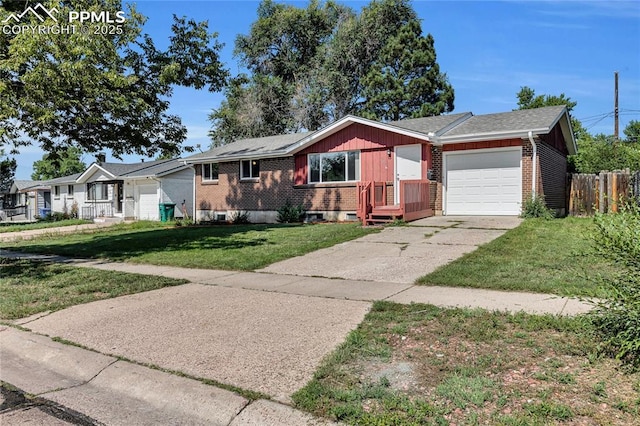 single story home featuring a garage and a front yard