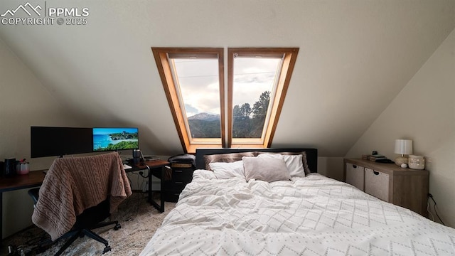 carpeted bedroom featuring vaulted ceiling