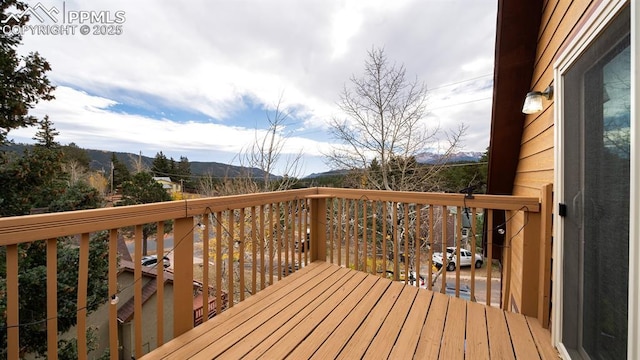 deck featuring a mountain view