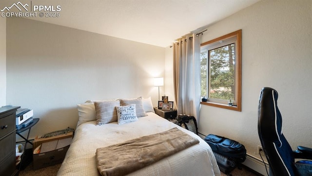 bedroom featuring baseboard heating