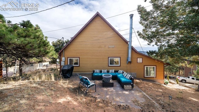 back of house featuring a patio