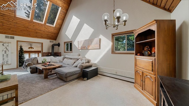 living room featuring wood ceiling, high vaulted ceiling, a wood stove, baseboard heating, and light colored carpet