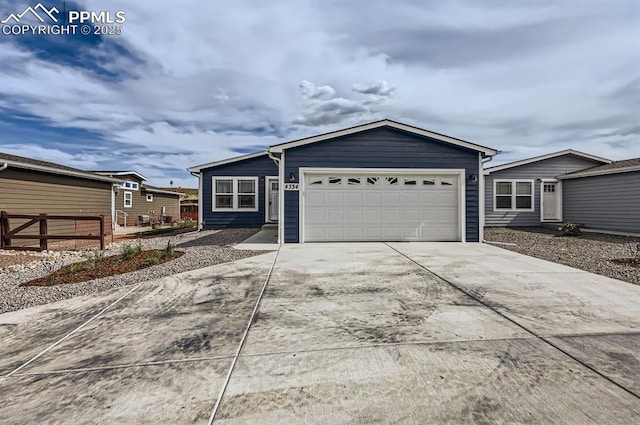 ranch-style house featuring a garage