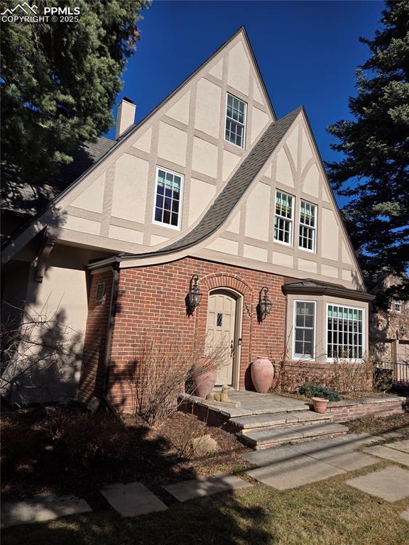 view of tudor-style house