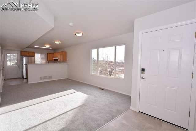 view of carpeted entryway