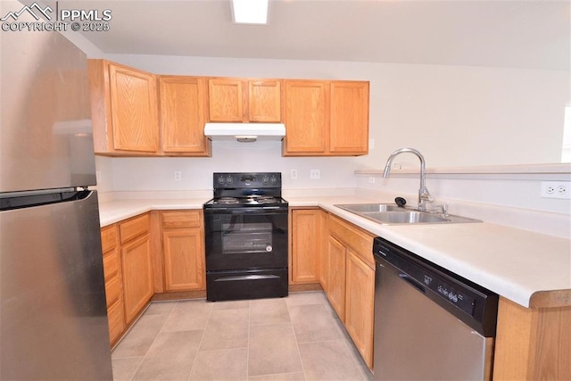 kitchen featuring sink, light brown cabinets, light tile patterned floors, appliances with stainless steel finishes, and kitchen peninsula