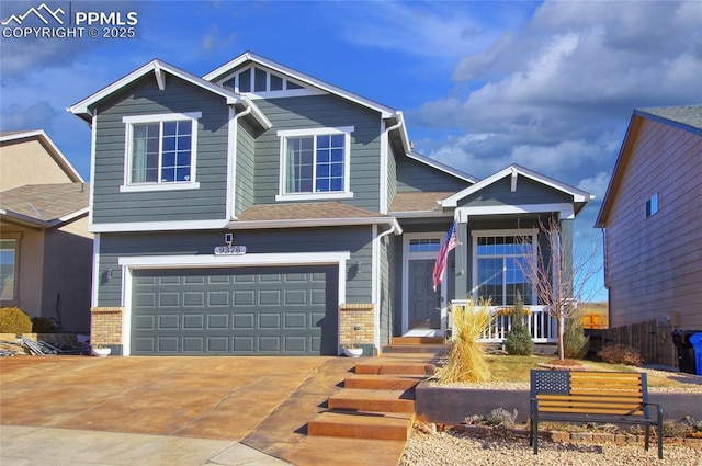 craftsman house with a garage