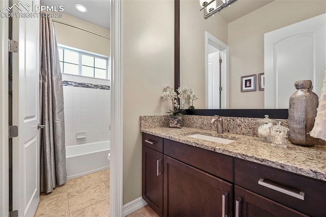 full bathroom with tile patterned floors, vanity, toilet, and shower / tub combo