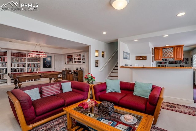 carpeted living room with billiards