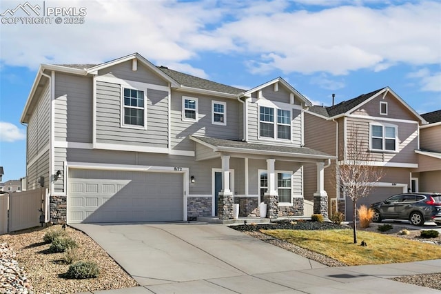 view of front of home with a garage and covered porch