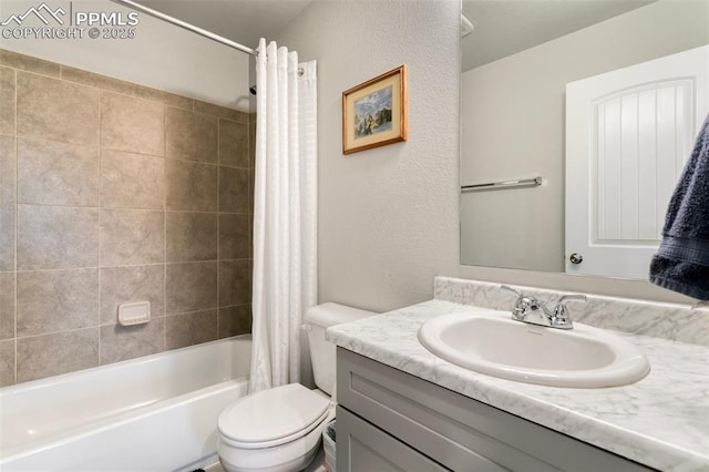 full bathroom with vanity, toilet, and shower / bath combo with shower curtain