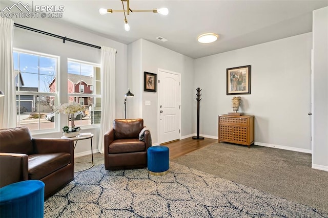 living area with a chandelier