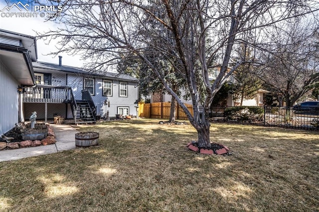 view of yard featuring a deck