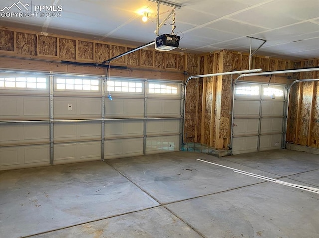 garage featuring a garage door opener