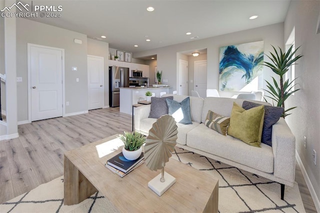 living room featuring light hardwood / wood-style floors