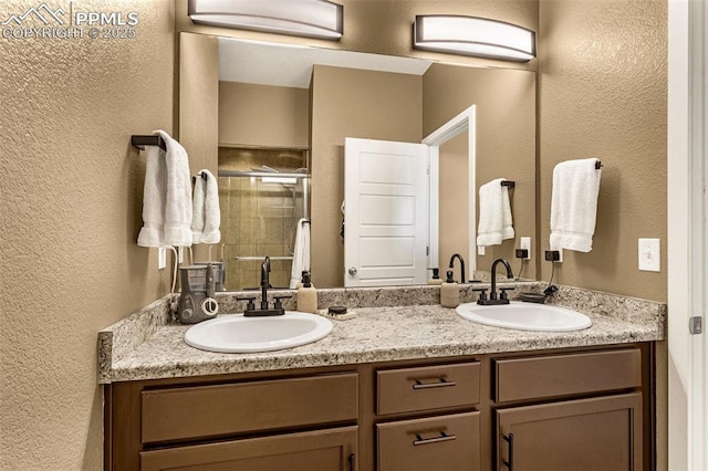 bathroom with vanity and walk in shower