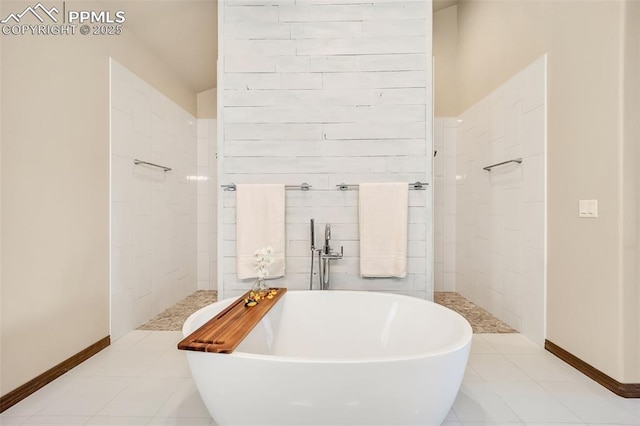 bathroom featuring a bathing tub and tile patterned floors