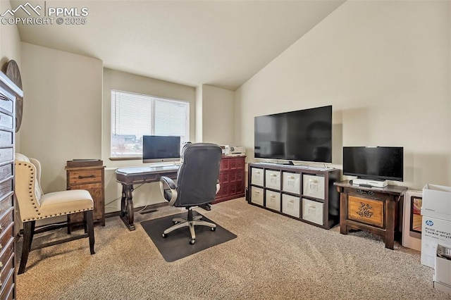 office space featuring light colored carpet and vaulted ceiling