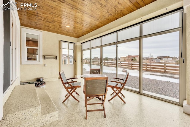 sunroom / solarium with wood ceiling