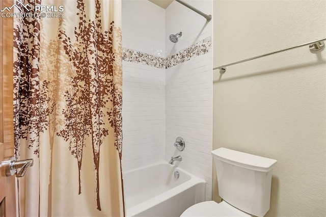 bathroom with shower / bathtub combination with curtain and toilet