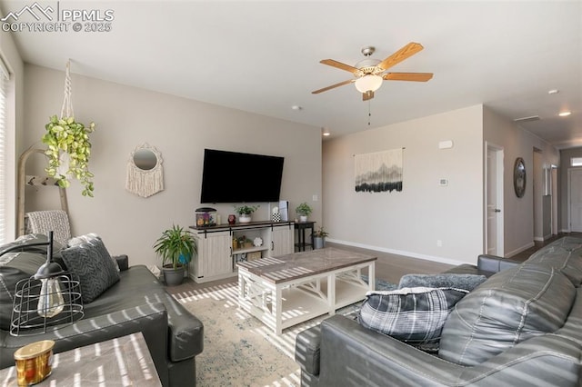 living room featuring ceiling fan