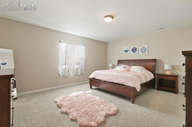 bedroom with light carpet