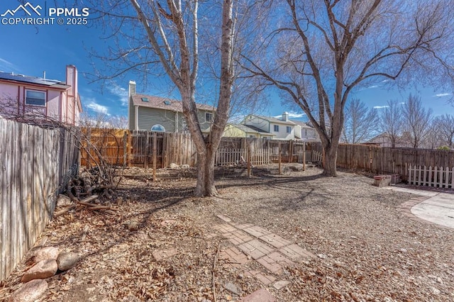 view of yard featuring a fenced backyard