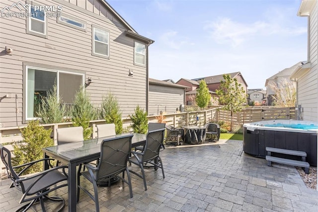 view of patio featuring a hot tub