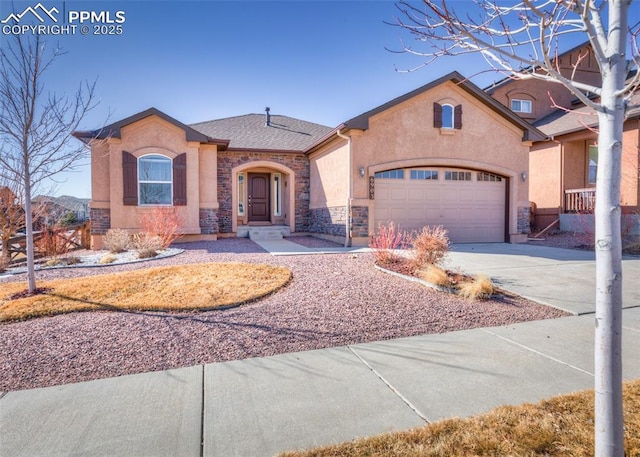 view of front of home with a garage