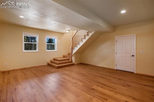 bonus room with hardwood / wood-style floors