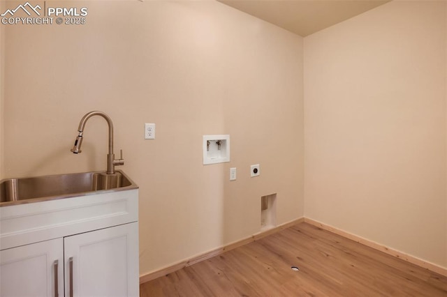 clothes washing area with sink, cabinets, washer hookup, electric dryer hookup, and light hardwood / wood-style flooring