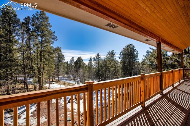 view of snow covered deck