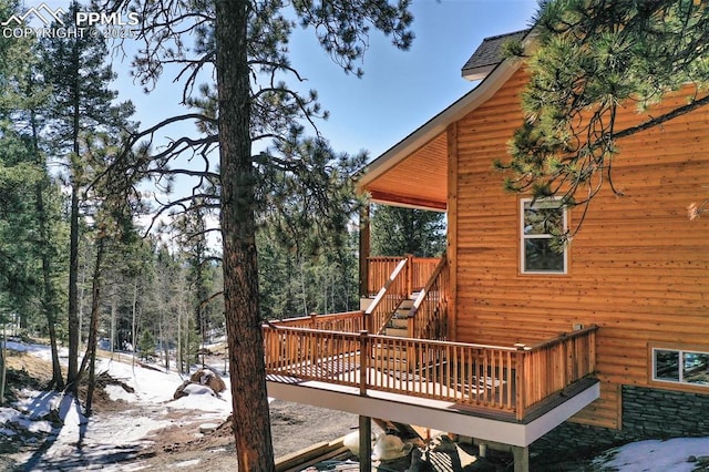 view of snow covered deck