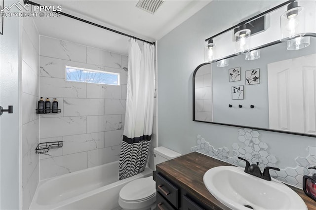 full bathroom featuring shower / tub combo, vanity, decorative backsplash, and toilet