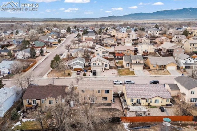 aerial view featuring a mountain view