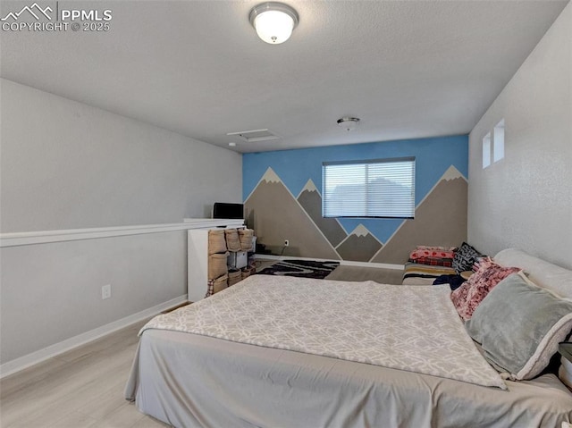 bedroom featuring light hardwood / wood-style flooring